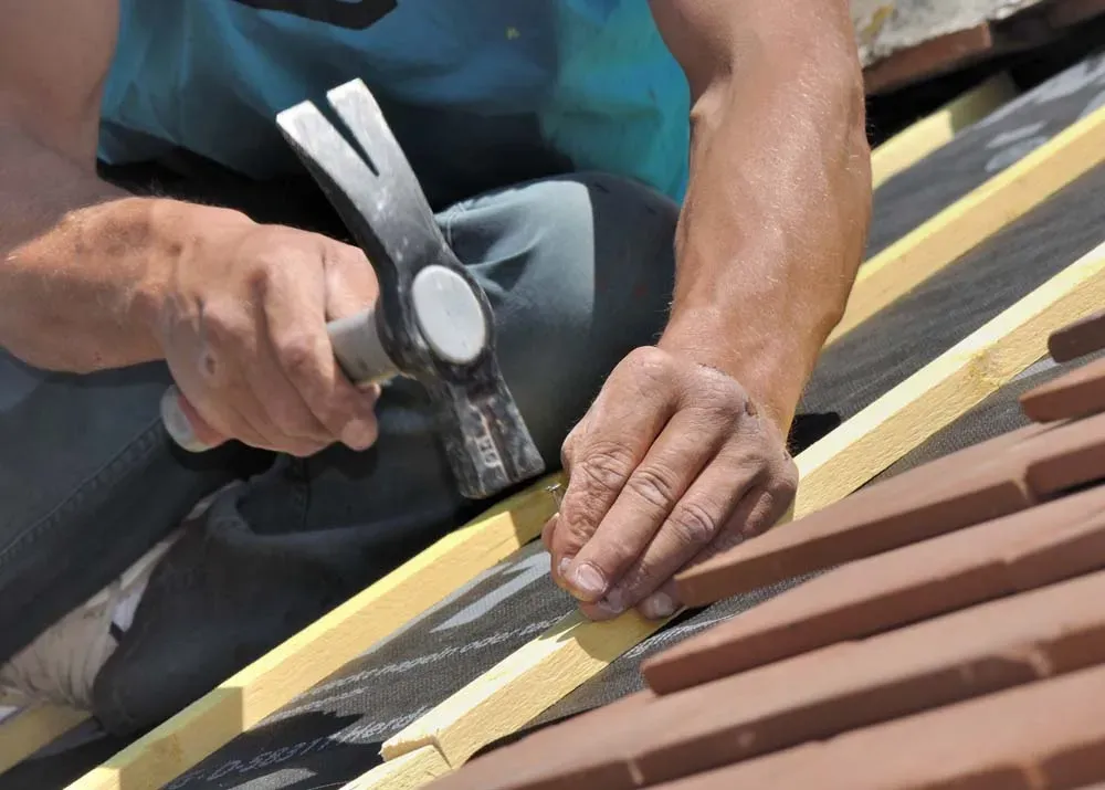 marteau toiture travaux